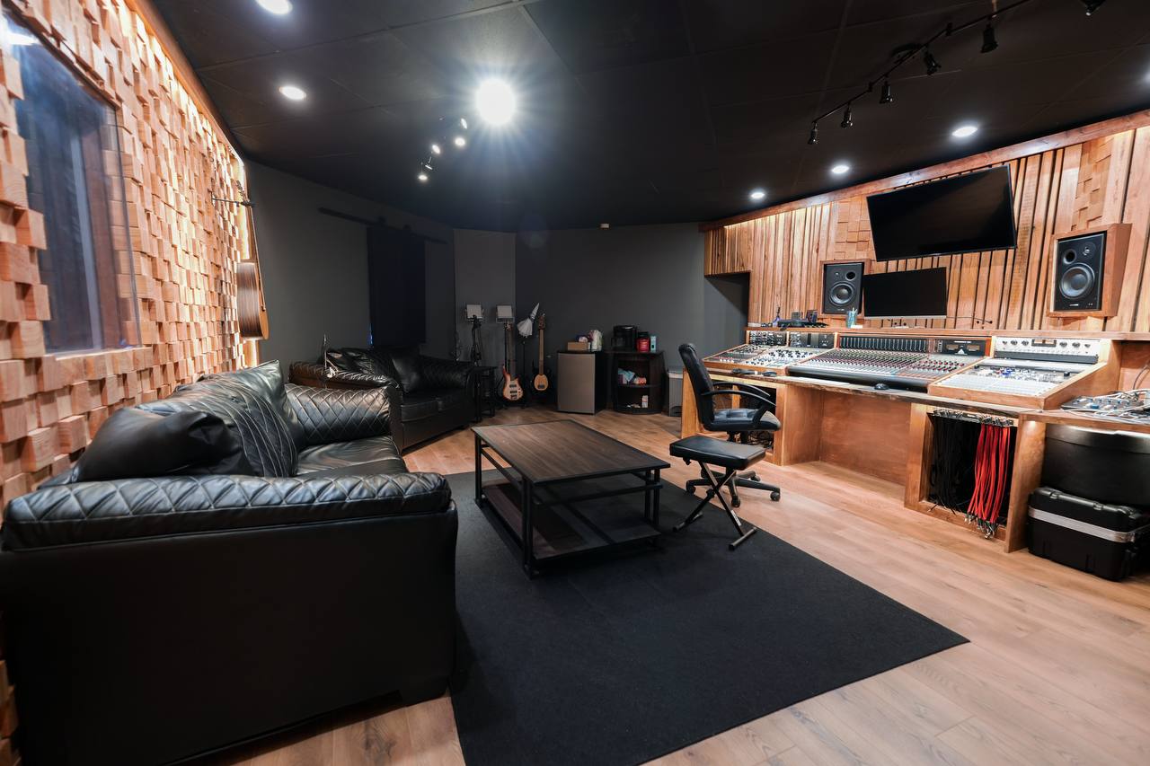 Control Room — mixing console and leather sofas